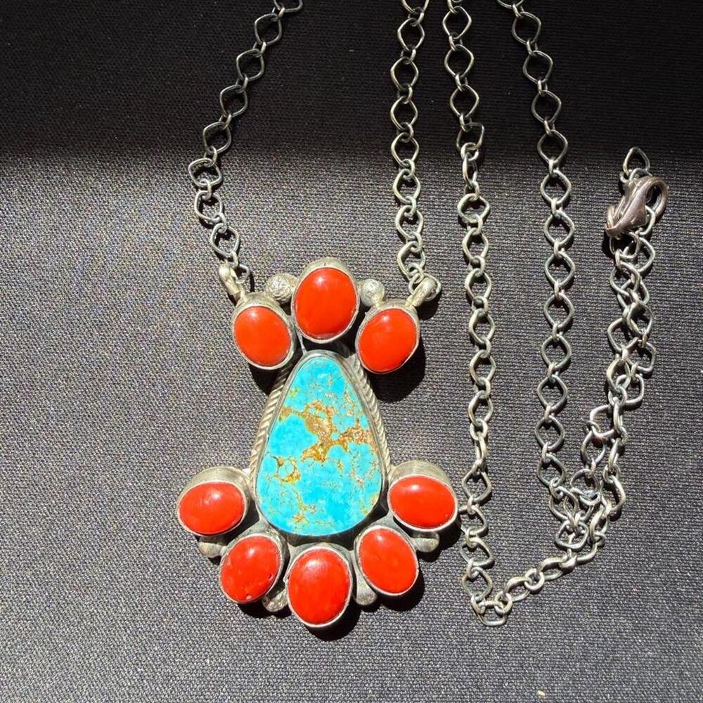 Native handmade sterling silver kingman turquoise and coral. Signed and stamped